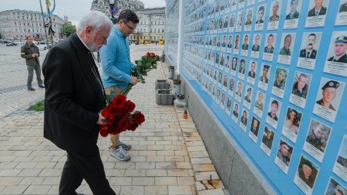 File Photo, May 2022: Archbishop Gallagher and Ukraine's Foreign Minister attend a ceremony at the Memory Wall of fallen Ukrainian defenders 